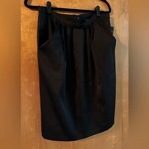 Onyx Nite brand , NWT size XL black skirt with pockets and pleats